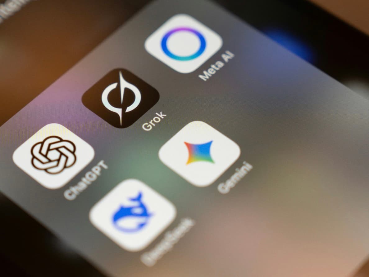 Phone home screen showing ChatGPT, Gemini, Meta AI, Grok, and DeepSeek app icons